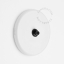 Round white porcelain light switch.