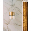 Brass pendant light with glass shade.