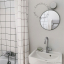 Black porcelain light for bathroom or outdoor use.