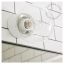 White porcelain wall light with glass globe for bathroom or outdoor use.