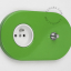 Green ovale outlet & switch with pushbutton.