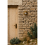 Outdoor round brass light.