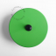 Round green and black pushbutton.