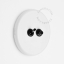 Round white porcelain light switch.