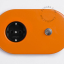 tomada e interruptor embutidos em laranja - botão de pressão niquelado