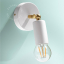 white adjustable wall light with brass arm