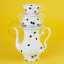Black dot porcelain teapot.