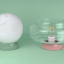 Lampe Art Deco en porcelaine rose avec globe en verre.