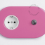 roze stopcontact met drukknop
