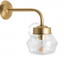 Brass retro wall light with glass globe for bathroom or outdoor use.