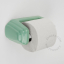 Green porcelain toilet paper holder.