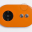 orangefarbene Unterputzsteckdose und -schalter - doppelt vernickelter Druckknopf