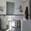 black porcelain wall light with glass shade
