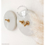 Round white porcelain light switch.