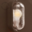 Brązowa lampa typu bulkhead.