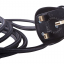 Black textile cable with type G plug and switch.