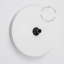 Round white light switch with black pushbutton