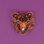 Tiger head brooch.