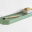 Washbasin shelf in green porcelain.