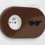 Brown flush mount outlet with toggle switch & pushbutton.