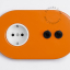 tomada embutida em laranja e interruptor bidirecional ou simples - dupla alavanca preta