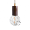 Brown pendant light with exposed bulb.