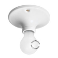 Lampe ronde en porcelaine blanche.