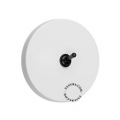 White round light switch with black toggle.