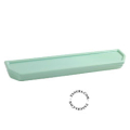 Washbasin shelf in green porcelain.