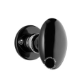 Poignée de porte en porcelaine noire forme olive.