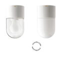 White porcelain light fixture with glass globe.