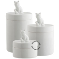 Porcelain container with a cat on the lid.