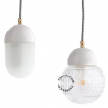 White porcelain pendant light with glass shade.