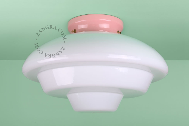 Pink porcelain Art Deco light with glass shade.