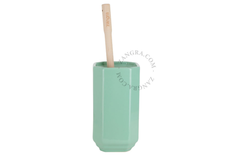 Green porcelain toilet brush holder.