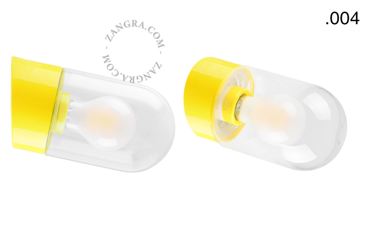 Yellow porcelain wall light with glass lampshade.