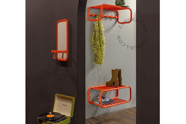 Retro mirror with three hooks.