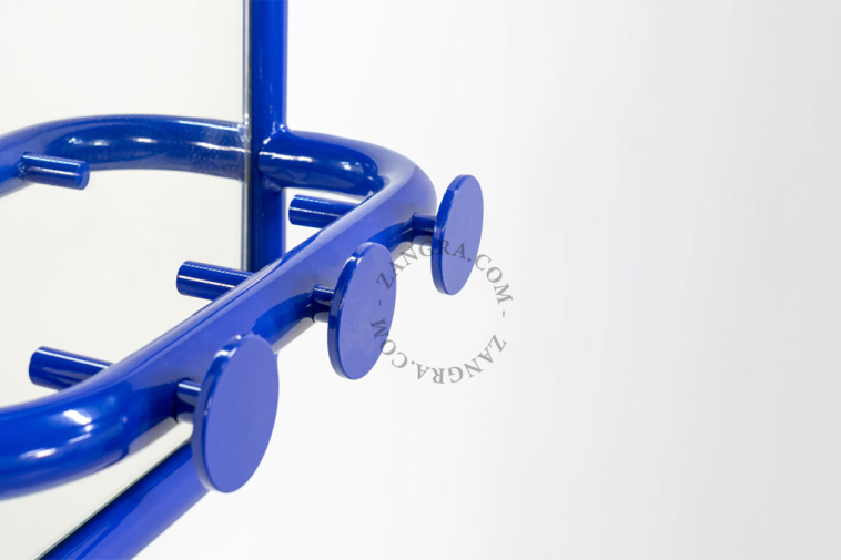 Retro mirror with three hooks.