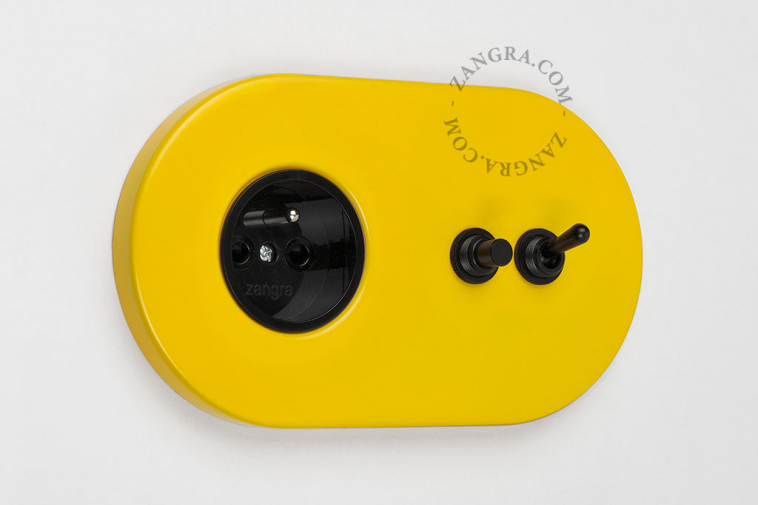yellow flush mount outlet & two-way or simple switch – black toggle & pushbutton