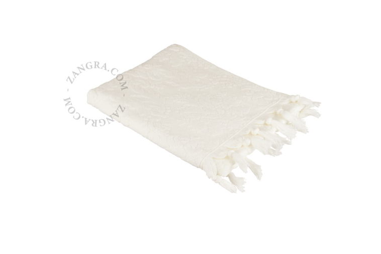 Ivory white fringe towel.
