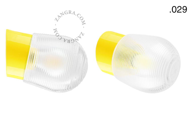Yellow porcelain wall light with glass lampshade.