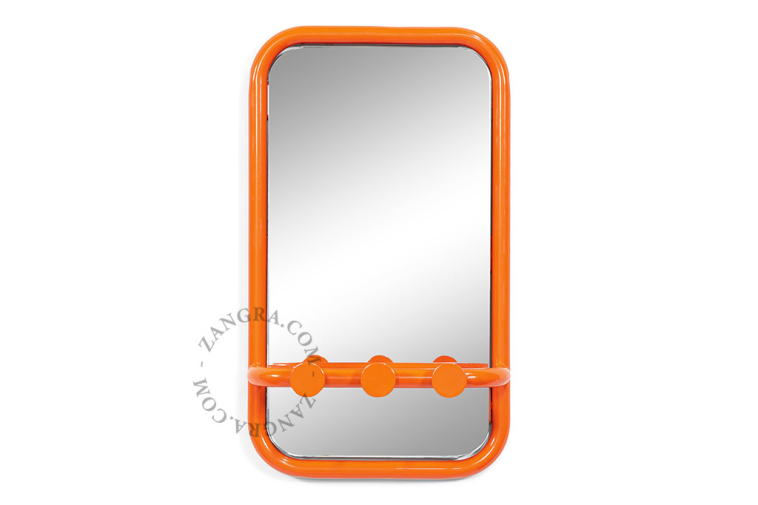 Retro mirror with three hooks.