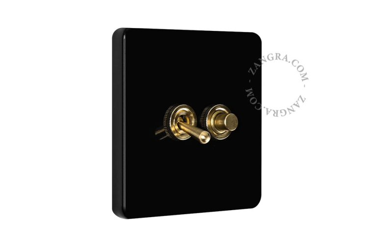 Black porcelain square-shaped switch.