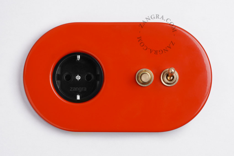 red flush mount outlet & two-way or simple switch – raw brass toggle & pushbutton