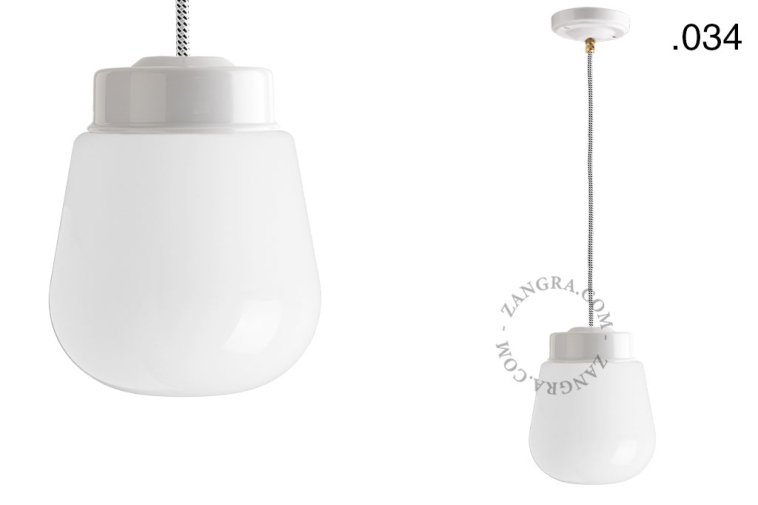 White porcelain pendant light with glass shade.