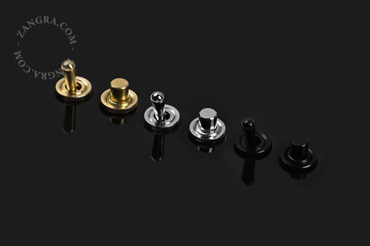 Black porcelain square-shaped push-button.