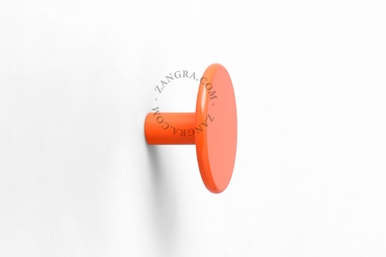 round orange wall hook or door knob