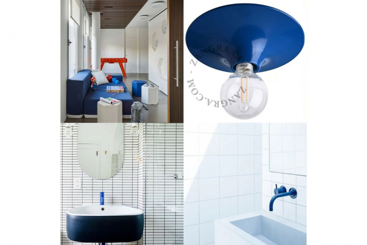 round blue wall or ceiling light