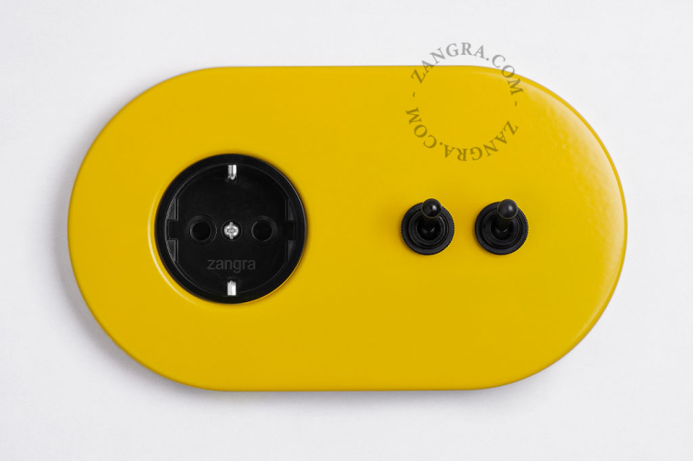 enchufe amarillo e interruptor simple o conmutado - 2 palancas negras