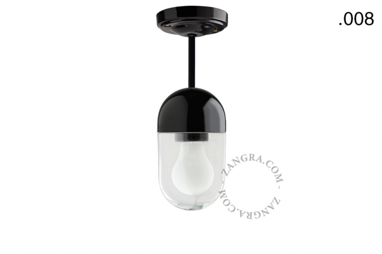 Black porcelain ceiling light with glass shade.